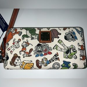 Brand new Disney Dooney and Bourke Toy Story wallet, new with tags.